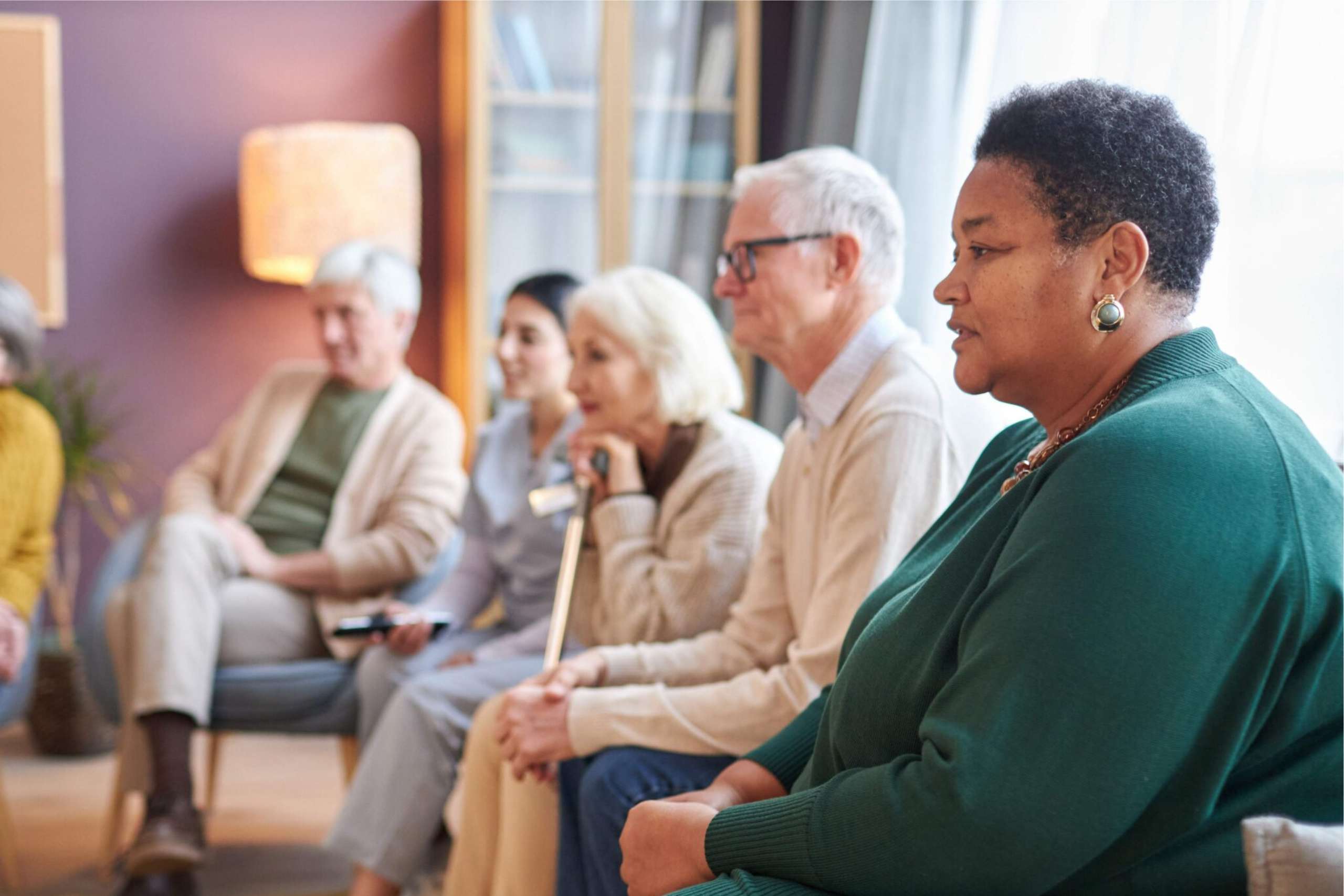 Seniors sitting together in a circle.